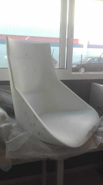 Bow seating collection featuring a continuous curved silhouette that balances sculptural presence and everyday comfort in contemporary interior spaces.