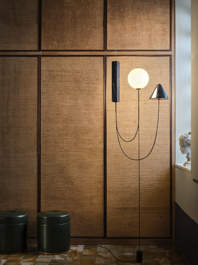 Mars floor lamp by KDLN creating a balanced composition of light with suspended spheres and sculptural elements in a residential interior