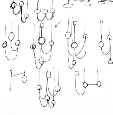 Mars floor lamp by KDLN creating a balanced composition of light with suspended spheres and sculptural elements in a residential interior