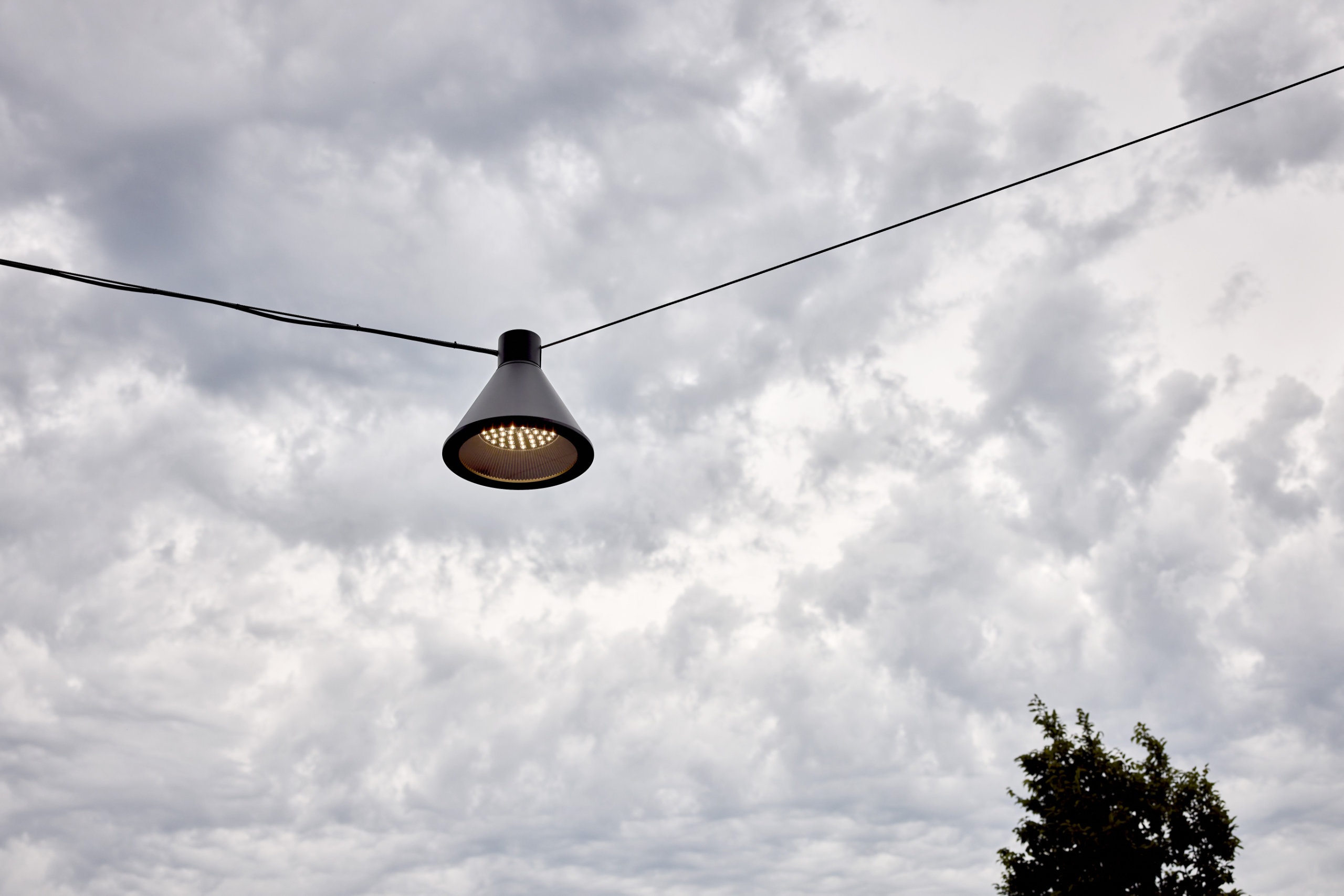 Moment streetlight, minimalist urban lighting design with a slim vertical profile