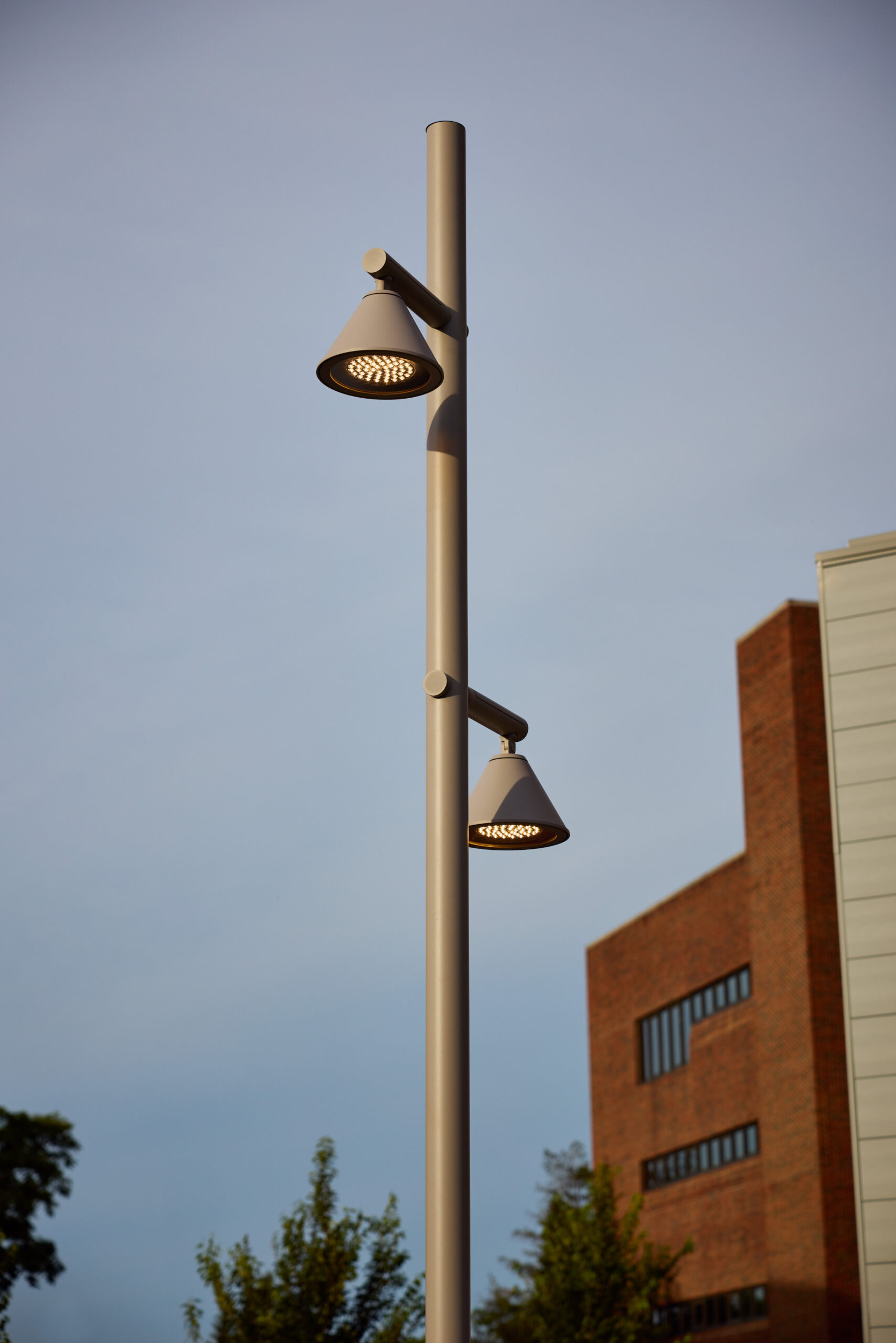 Moment streetlight, minimalist urban lighting design with a slim vertical profile