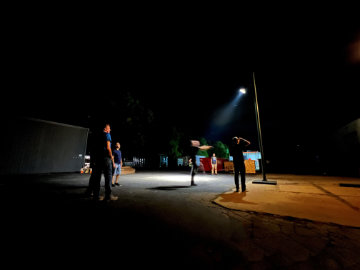 Moment streetlight, minimalist urban lighting design with a slim vertical profile