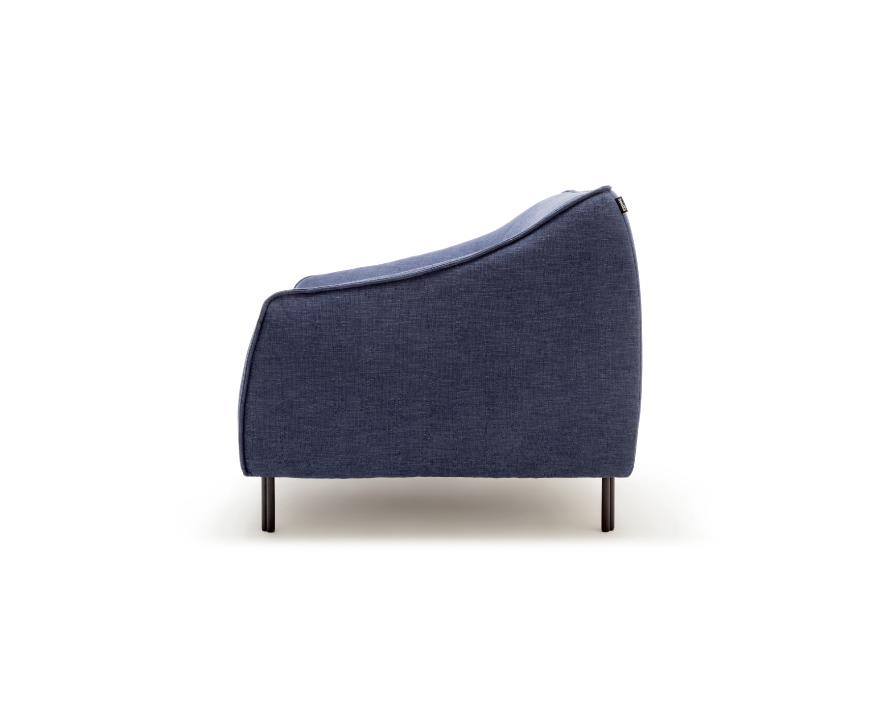 freistil 132 sofa with sculptural curved silhouette in contemporary interior