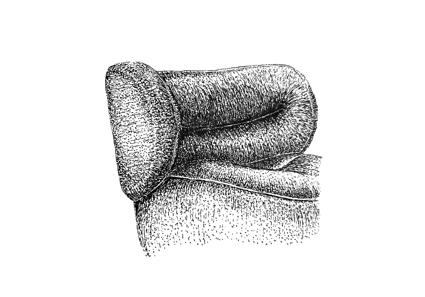 Amelie armchair in a relaxed interior setting highlighting its sculptural presence.