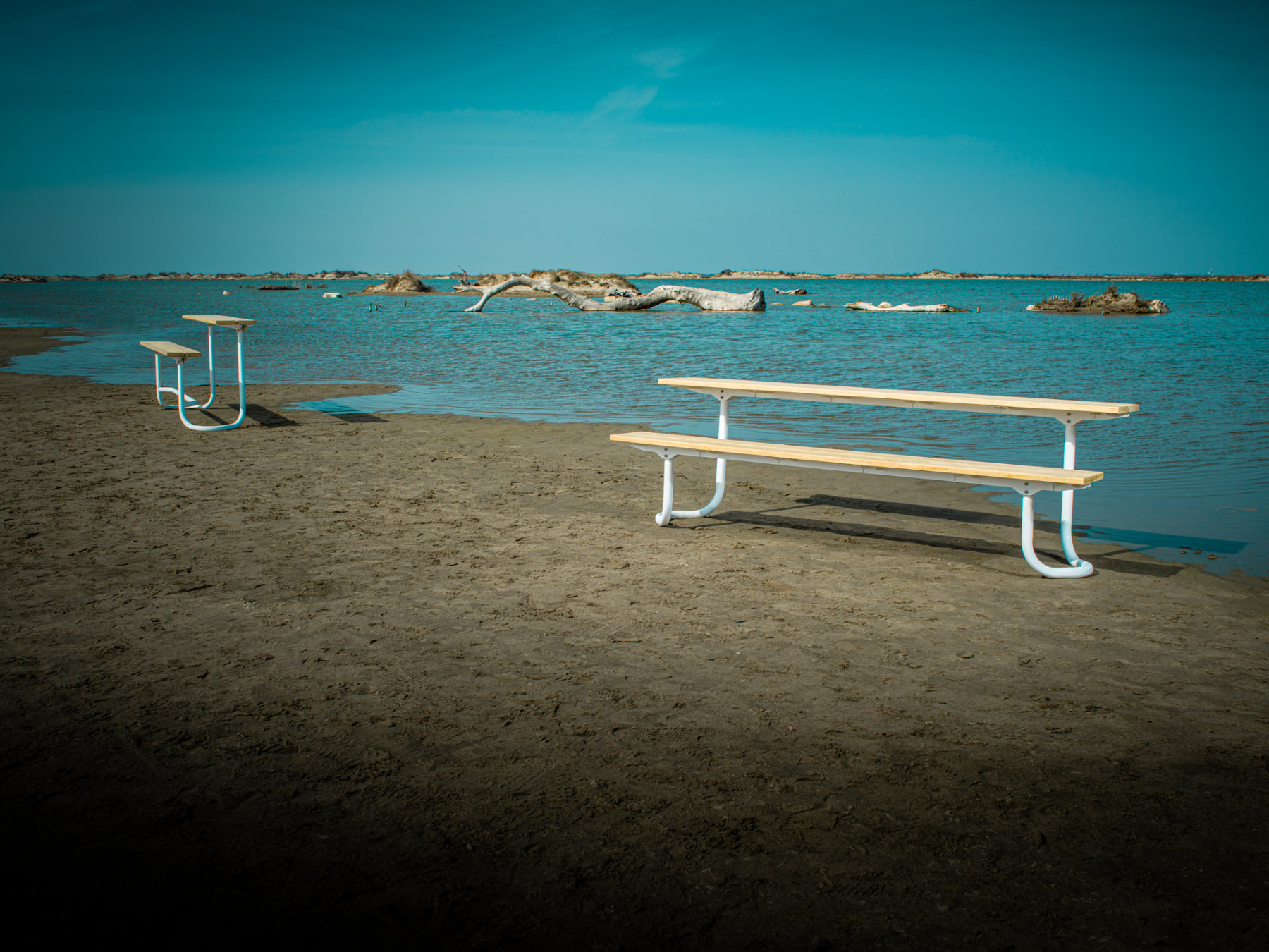 Modular outdoor bench and picnic table with refined geometry and flexible configurations designed for public space