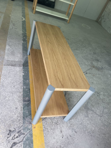 Open modular shelving system with clean lines and warm wood finish