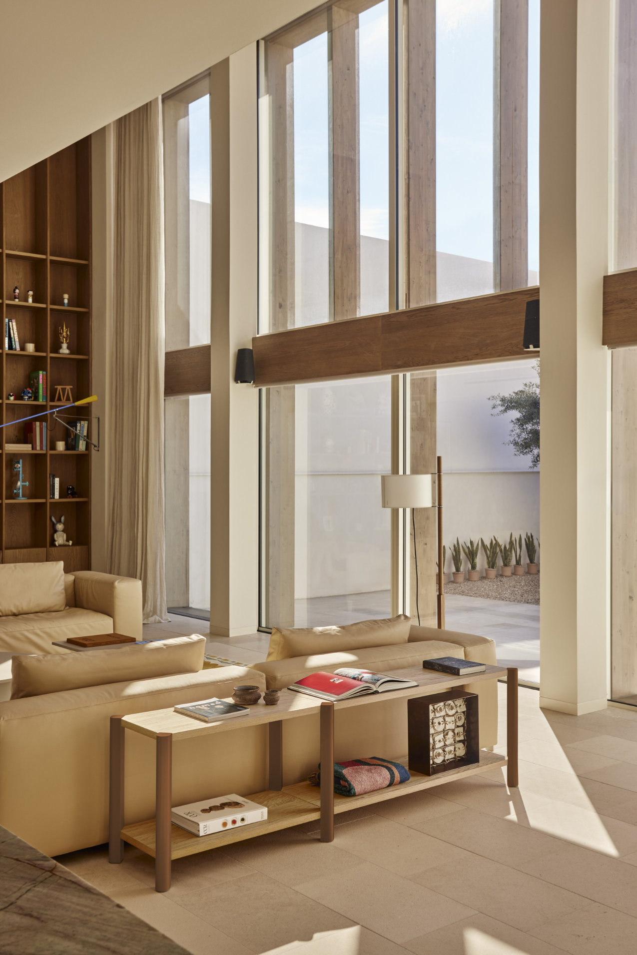 Open modular shelving system with clean lines and warm wood finish