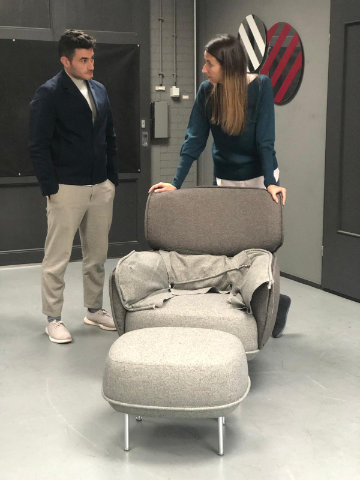 Cabut armchair in a modern interior with upholstered seat and defined silhouette