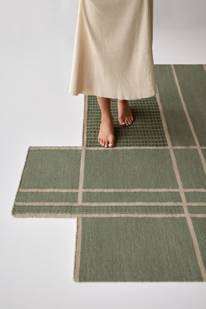 Caminos rug with textured pattern inspired by natural paths