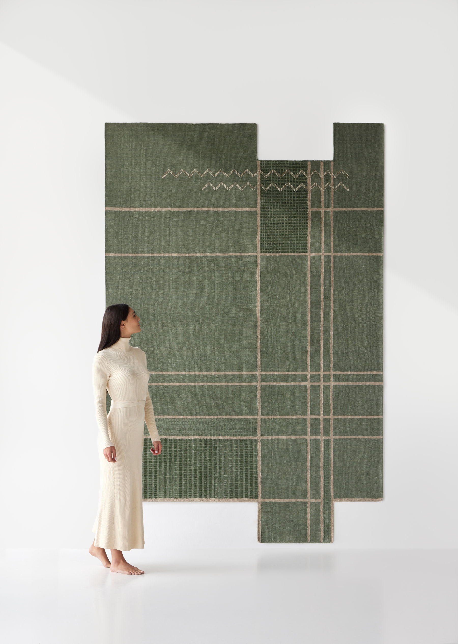 Caminos rug with textured pattern inspired by natural paths