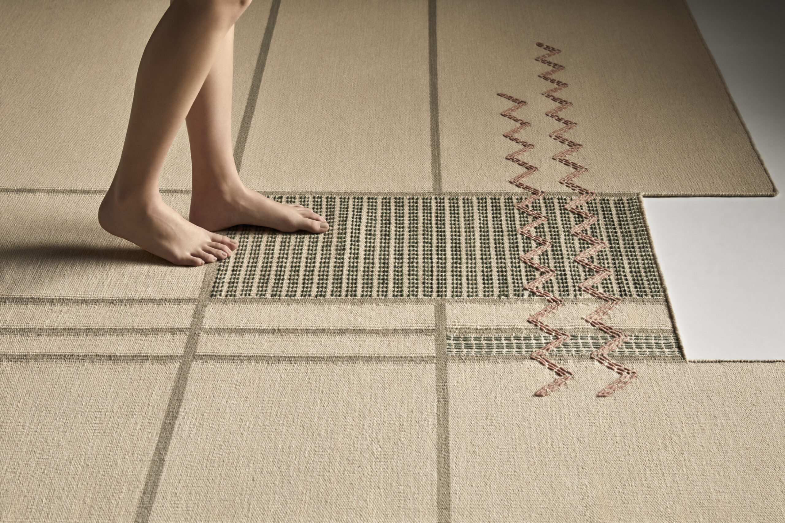 Caminos rug with textured pattern inspired by natural paths