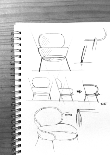 Carmen armchair in contemporary interior showing refined silhouette and tactile upholstery