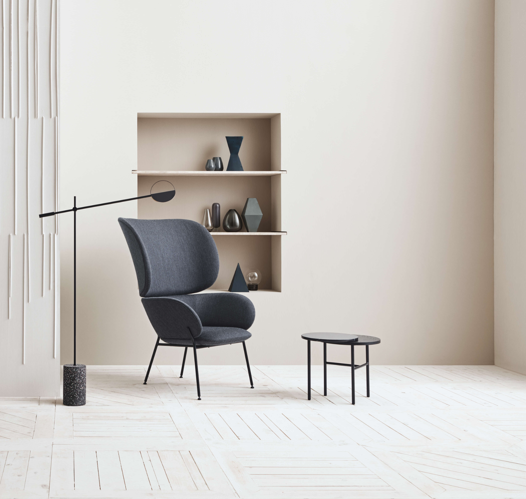 Carmen armchair in contemporary interior showing refined silhouette and tactile upholstery