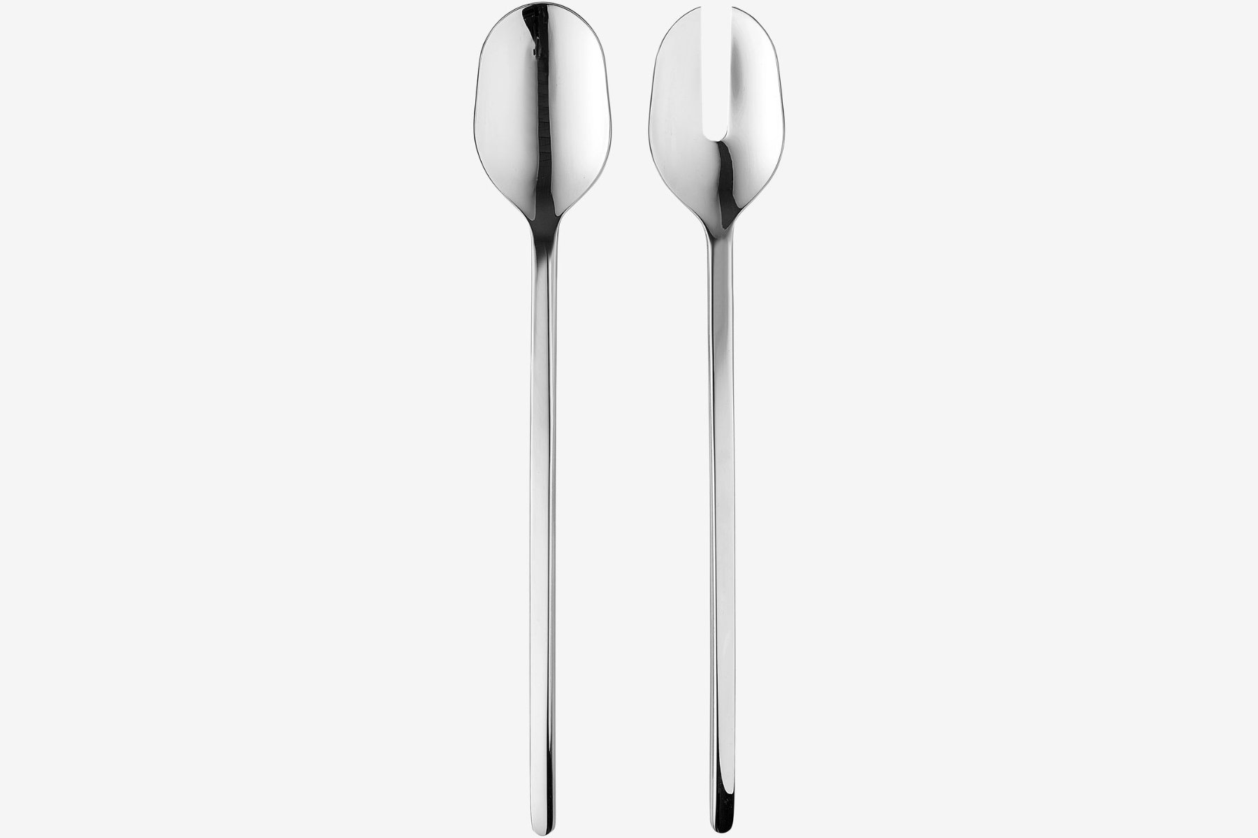 Carved cutlery set on a minimalist dining table