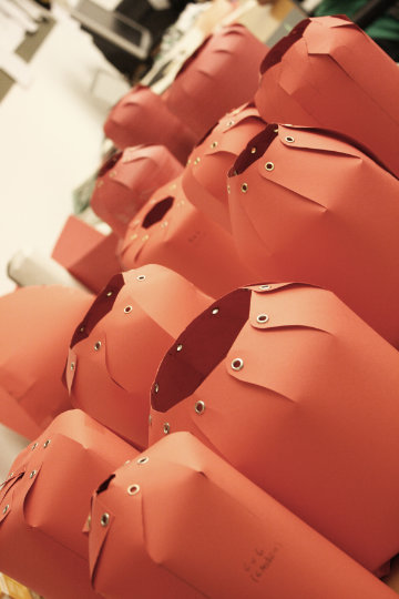 Chou lamp by LZF with folded silhouette illuminating interior