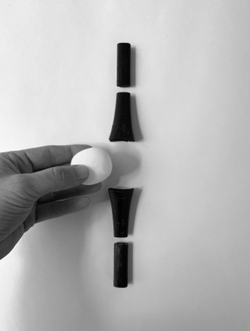 Dew lamp with softly glowing body in modern interior