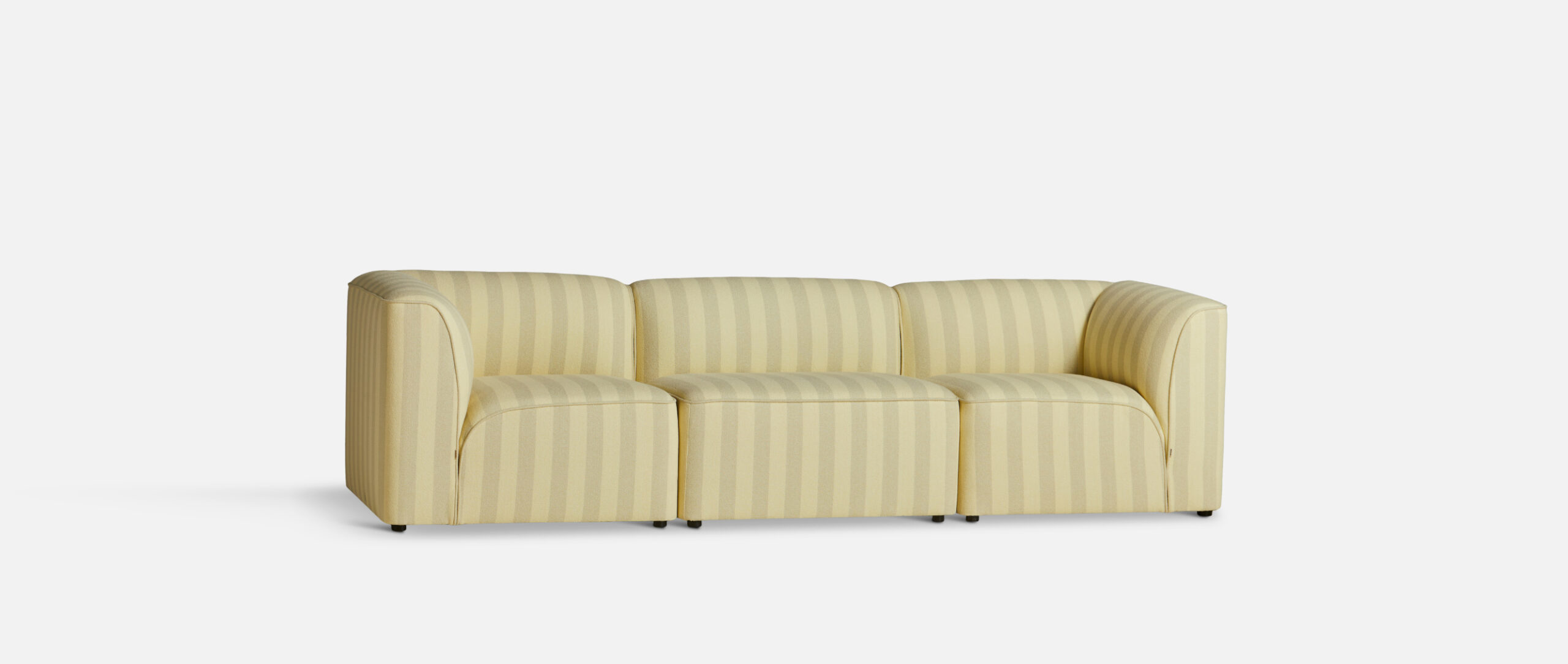 Flora modular sofa system in contemporary interior with varied configurations
