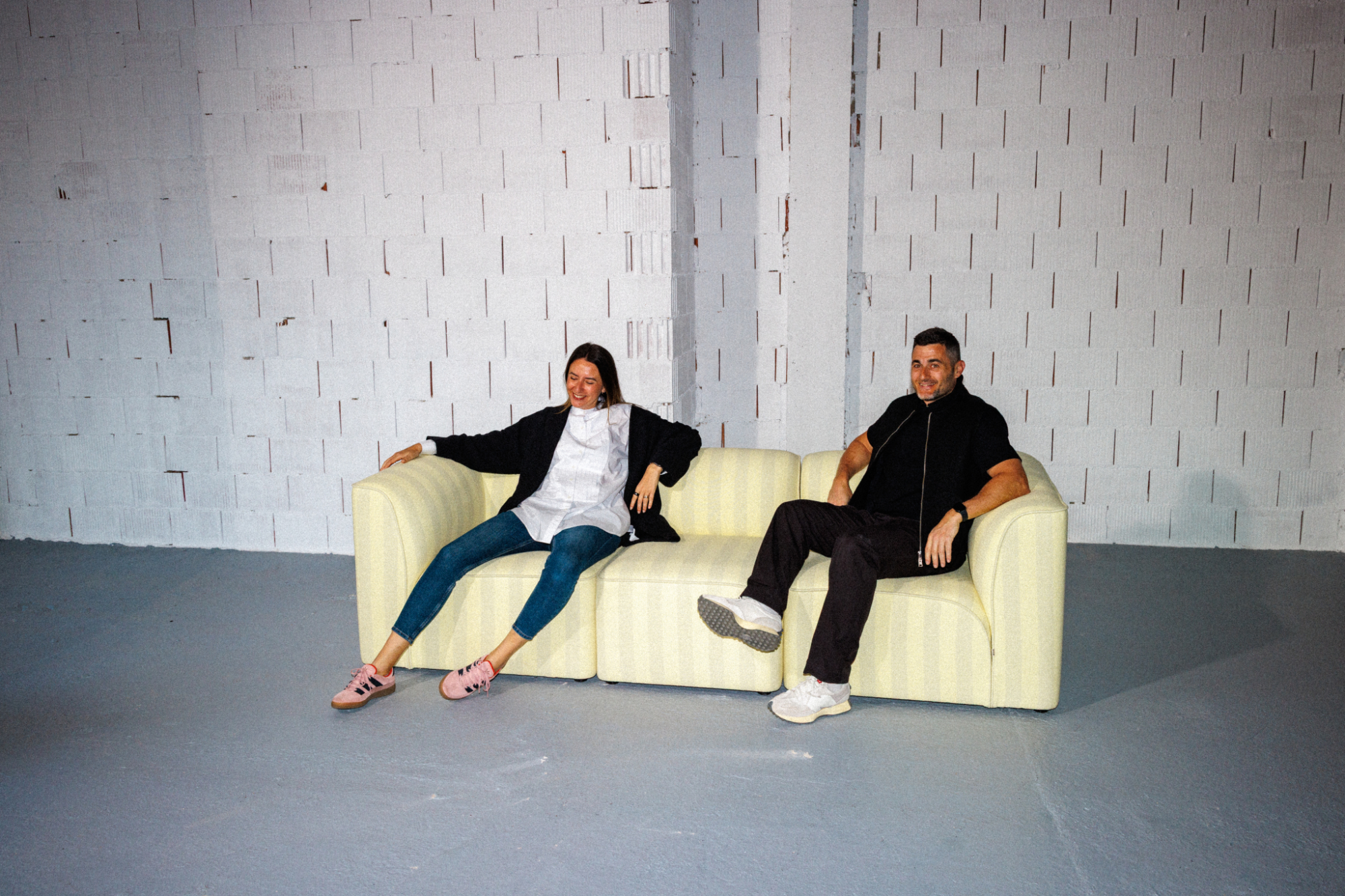 Flora modular sofa system in contemporary interior with varied configurations with Clara and Alex
