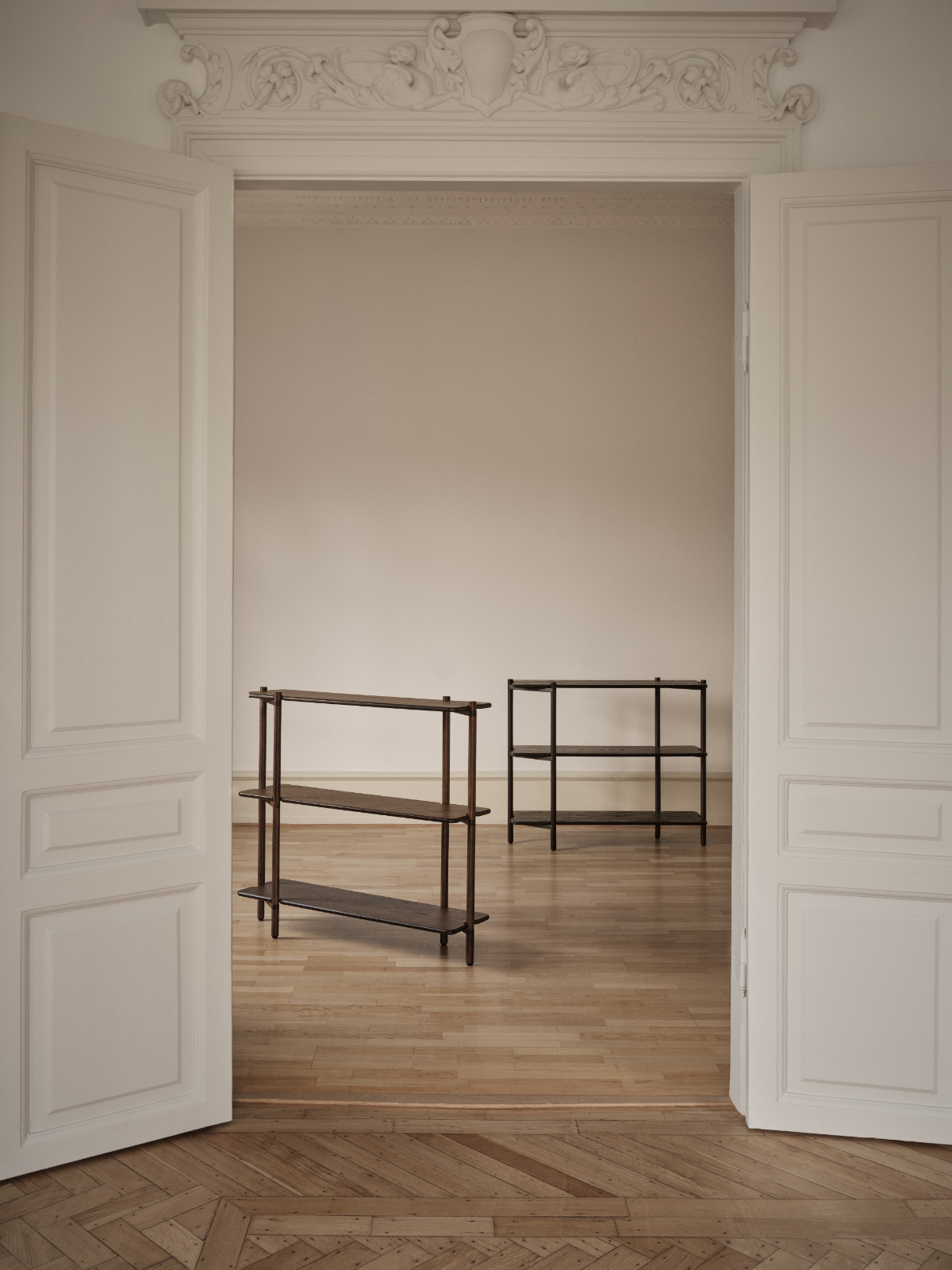 Modular shelving system with refined proportions and flexible configuration options that shape space with calm presence