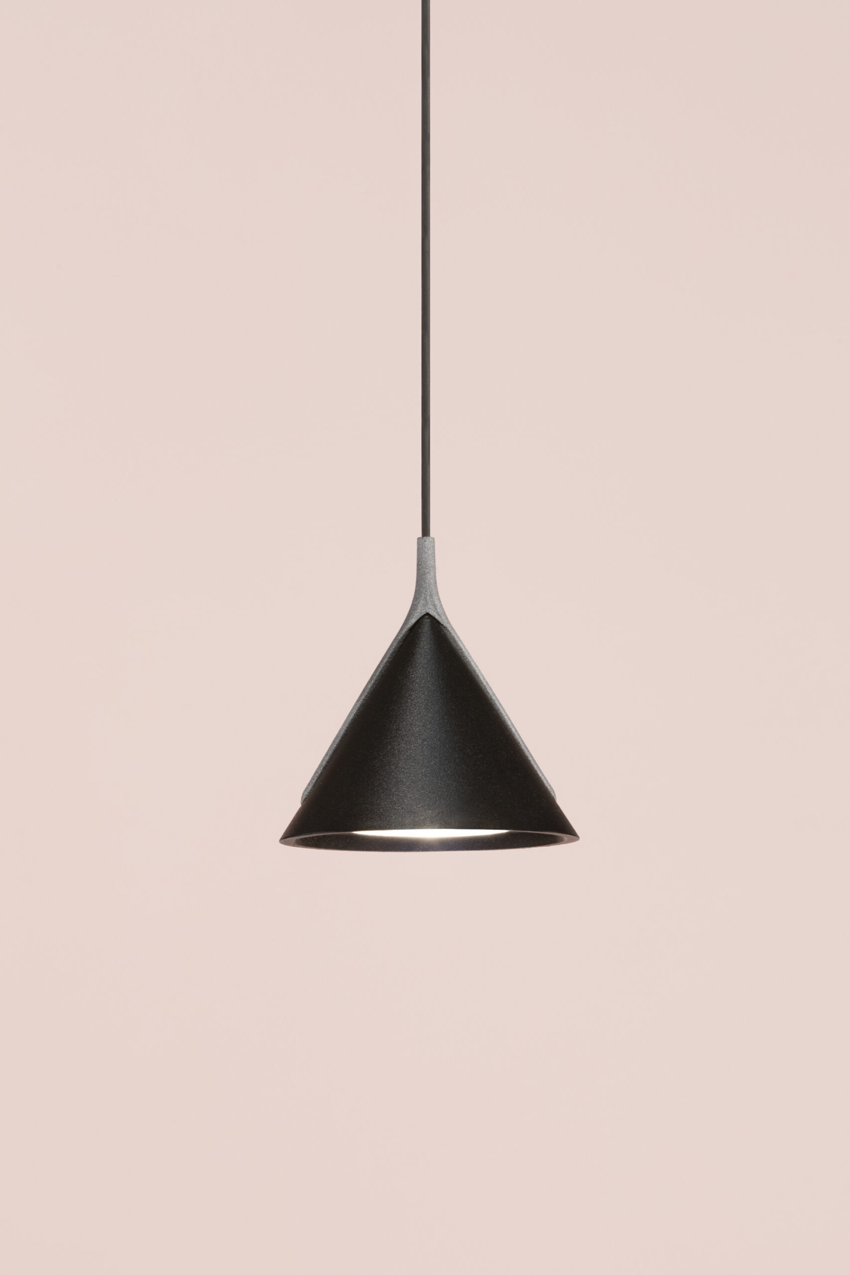 Jewel sustainable lamp with minimalist form and warm light in interior