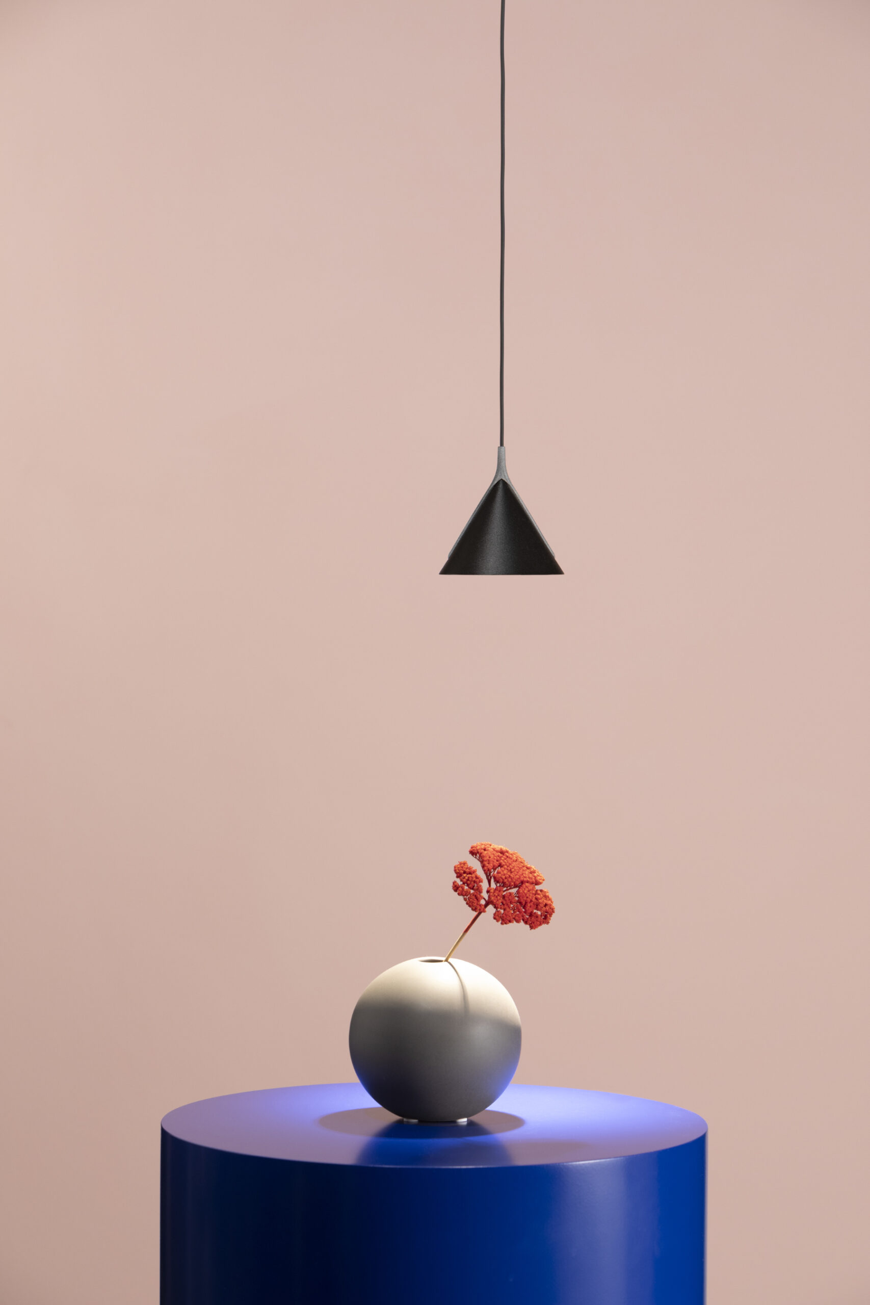 Jewel sustainable lamp with minimalist form and warm light in interior