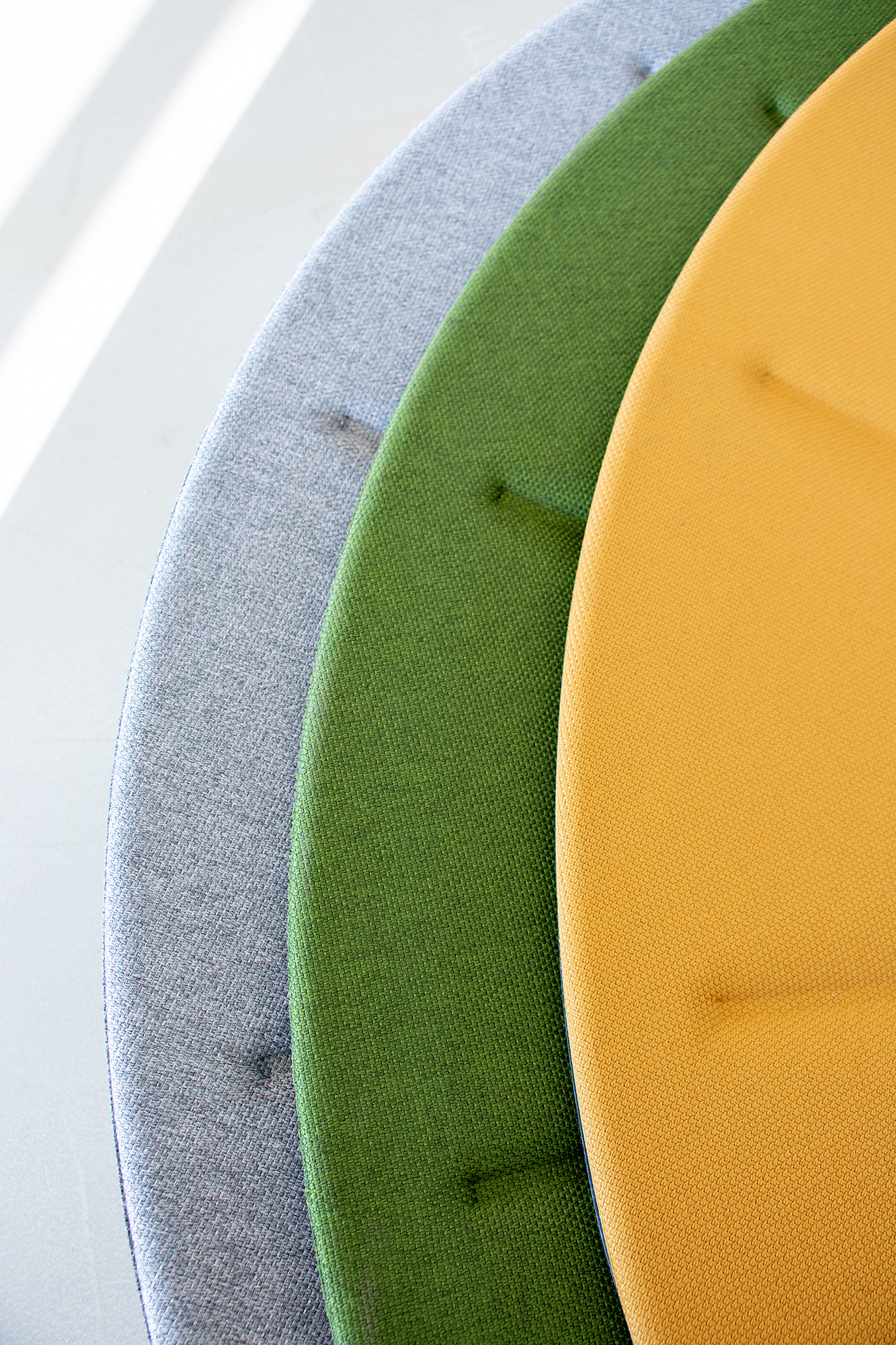 Lent acoustic lamp in contemporary interior with soft lighting and sound-absorbing surface