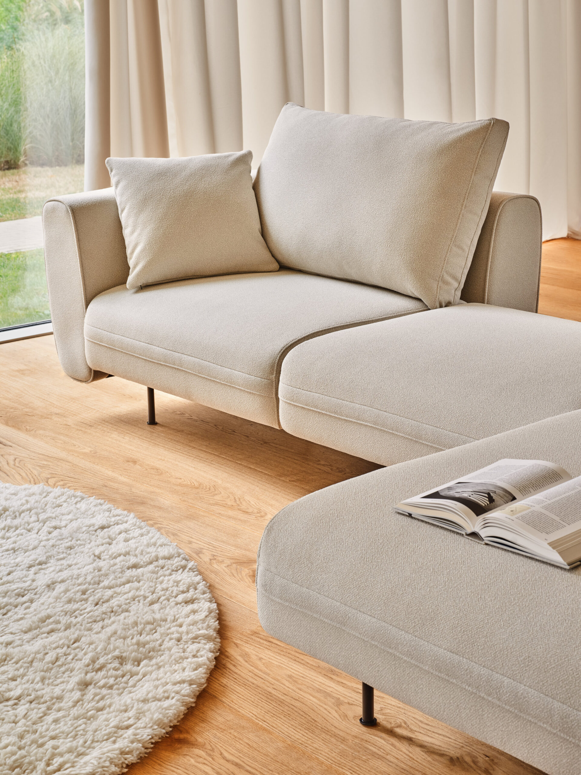 Lotus modular sofa system with refined geometric volumes