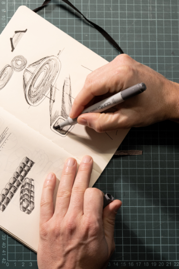 Mediterranean Collection ceiling luminaire in Crismosil featuring radial textured surface and warm integrated LED light