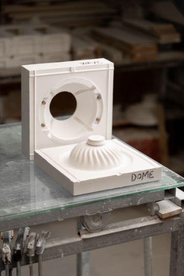 Mediterranean Collection ceiling luminaire in Crismosil featuring radial textured surface and warm integrated LED light