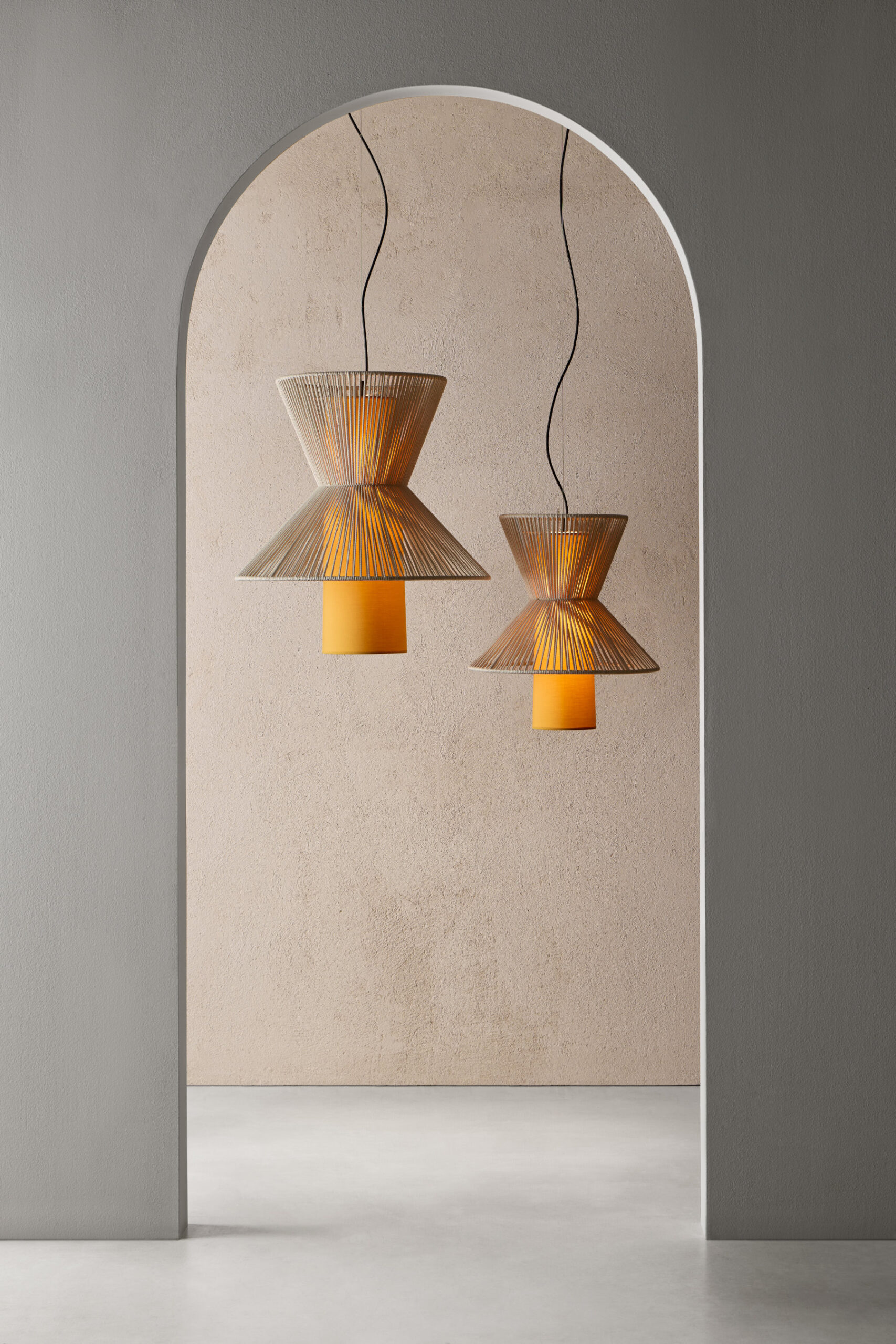 Moixent suspension lamp casting warm ambient light