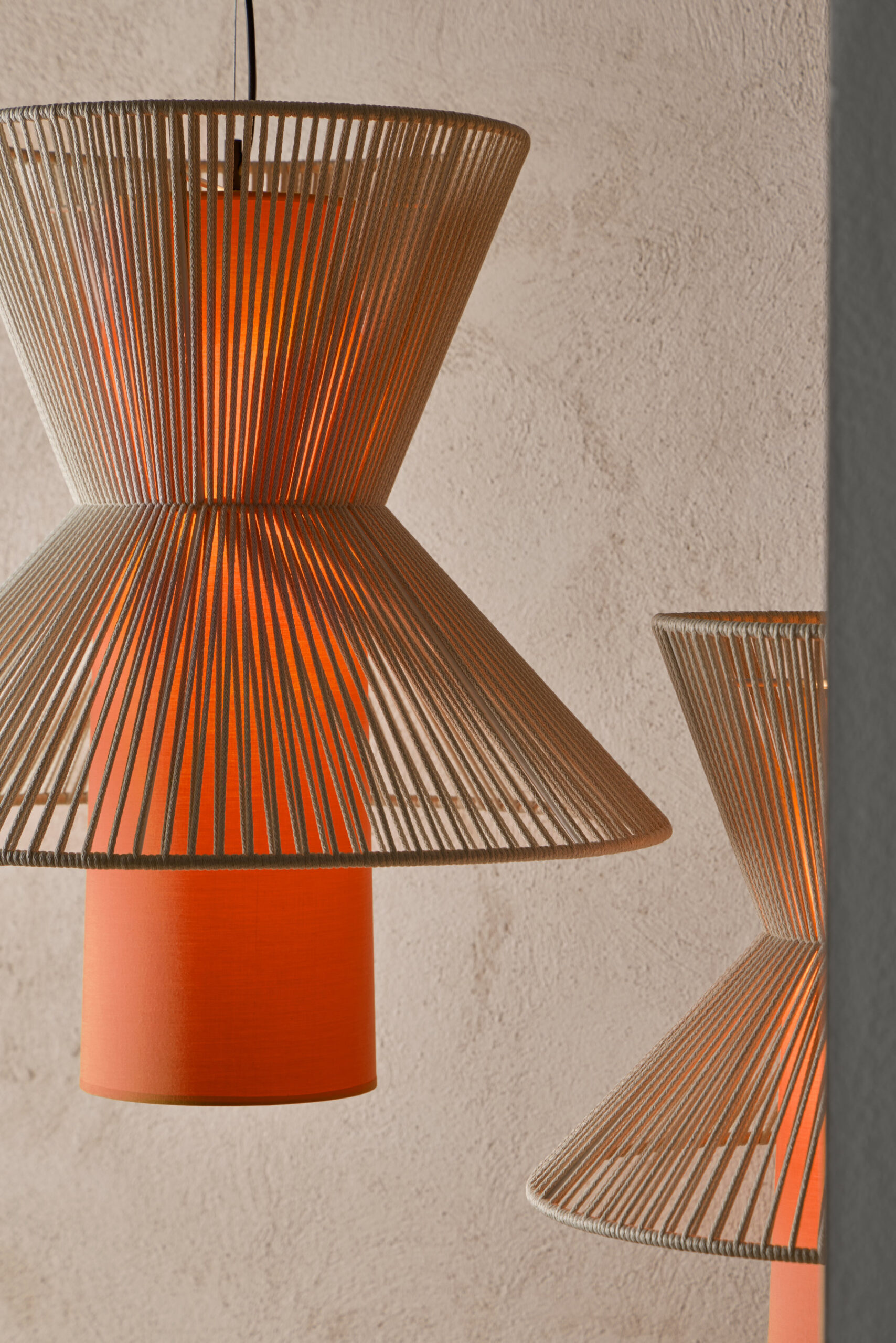 Moixent suspension lamp casting warm ambient light