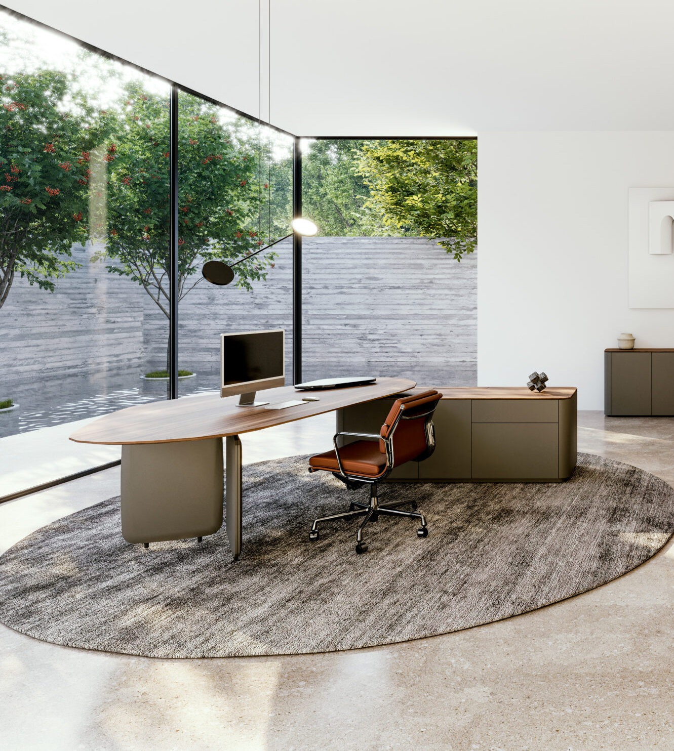 Nautilus is a refined office furniture collection that combines fluid geometry with structured presence. Developed to meet the evolving needs of contemporary workspaces, it offers a high-quality desk sharing system with enhanced visual privacy, adaptable configurations and a thoughtful balance between openness and defined zones. Smooth lines and interconnected surfaces define its identity, allowing Nautilus to articulate space with clarity and calm. The collection can be arranged in single or multi-workstation layouts, offering practical options to structure environments with both efficiency and aesthetic coherence.
