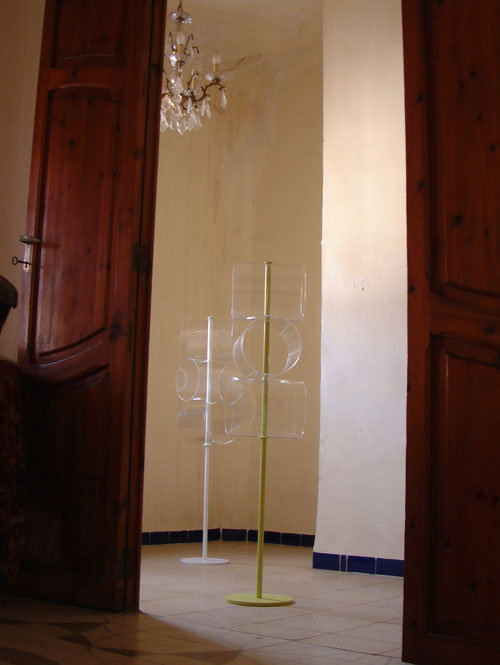 Detail of objects displayed at “Nude 2004” Yonoh exhibition highlighting spatial relationships and minimalist geometry