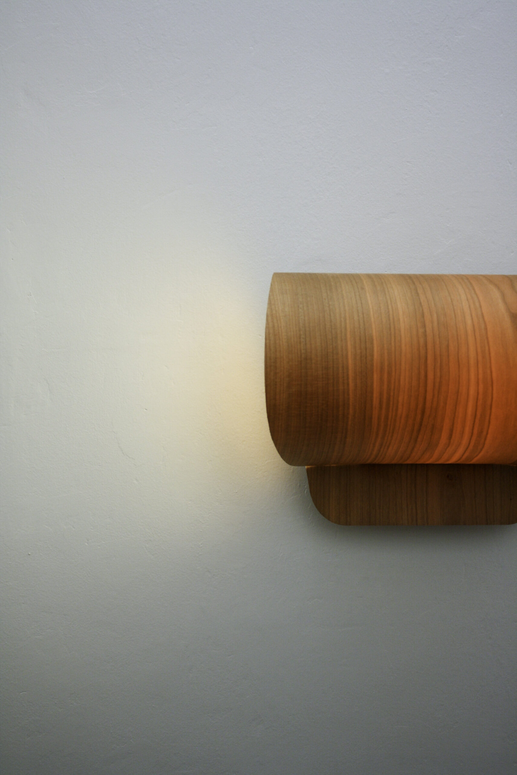 Pleg lamp with folded geometric form casting soft light