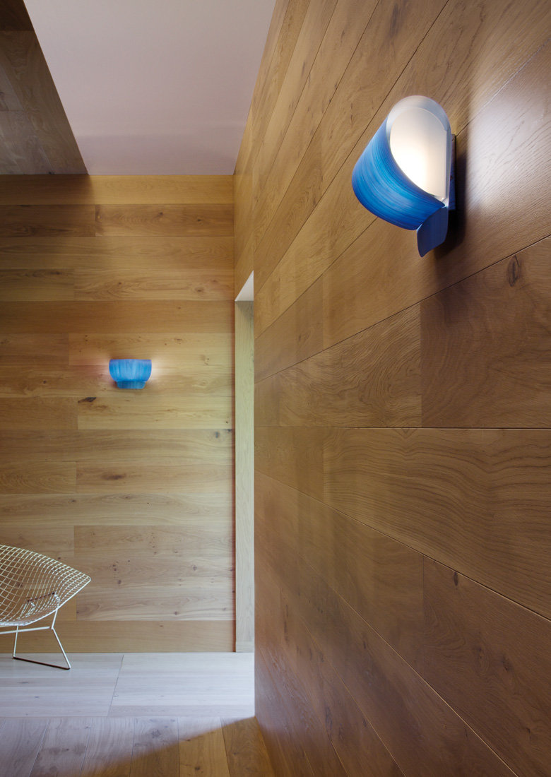 Pleg lamp with folded geometric form casting soft light