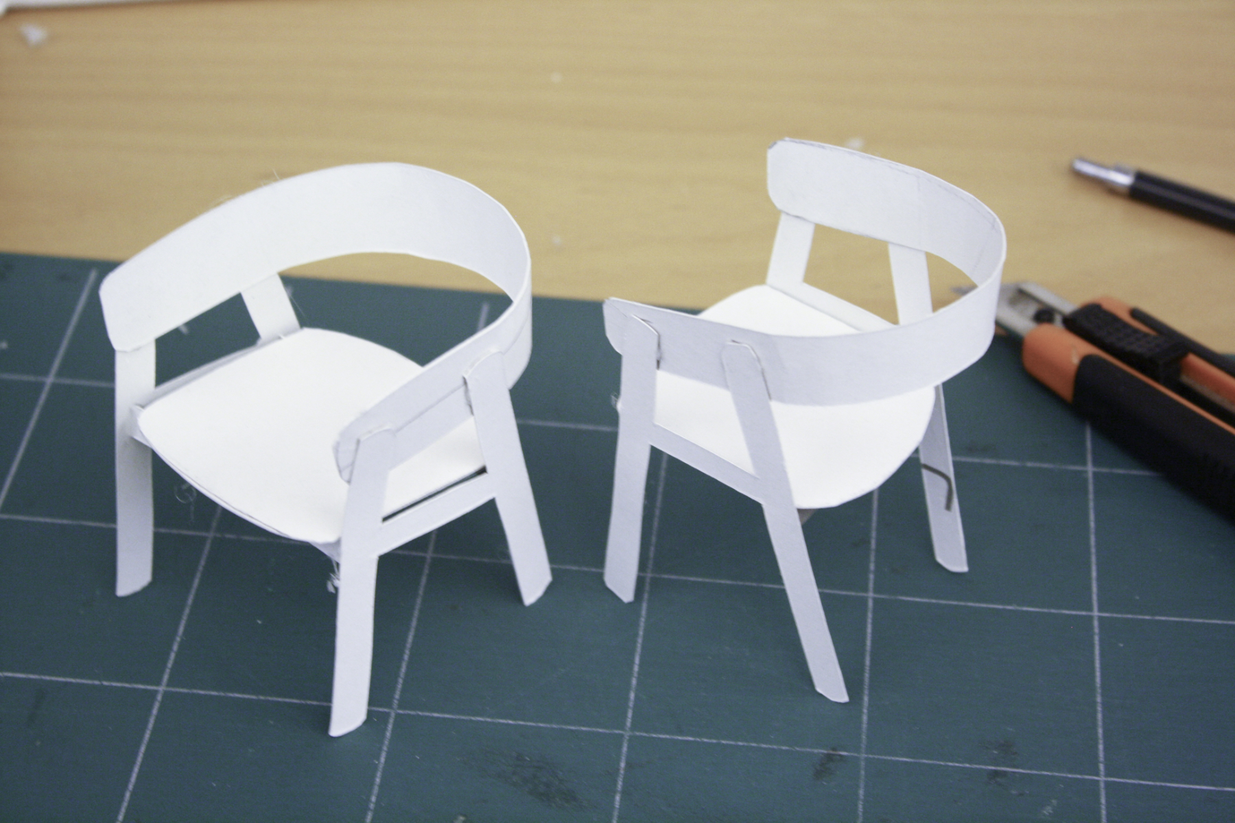 Polo chair with clean silhouette in contemporary interior