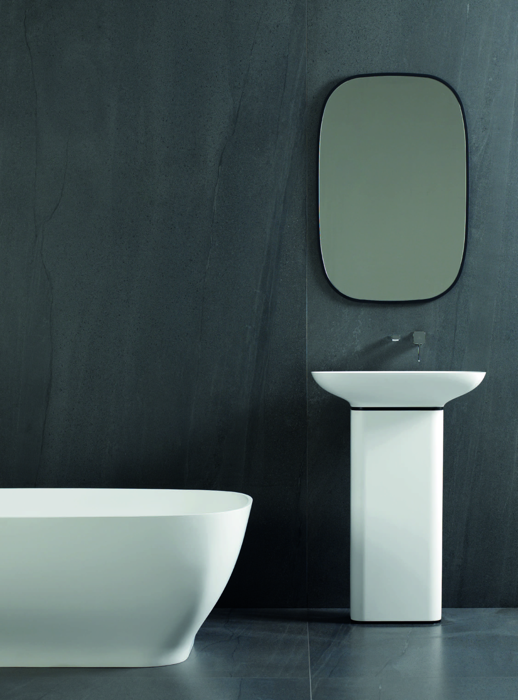 Pure bathroom collection by Yonoh for Porcelanosa with KRION basins and minimalist geometry