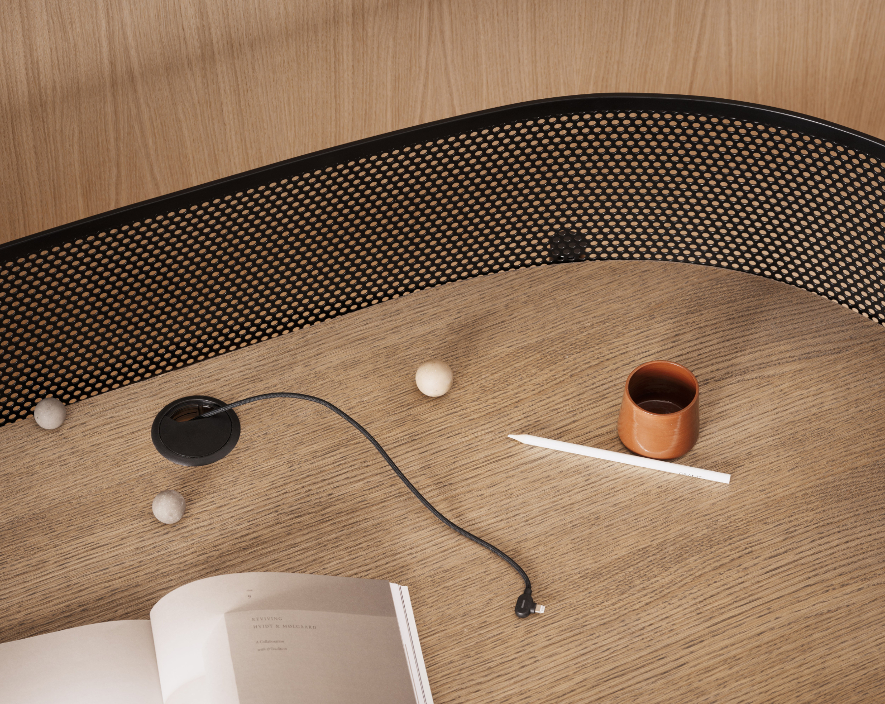 Shelter desk in contemporary office interior with refined geometry