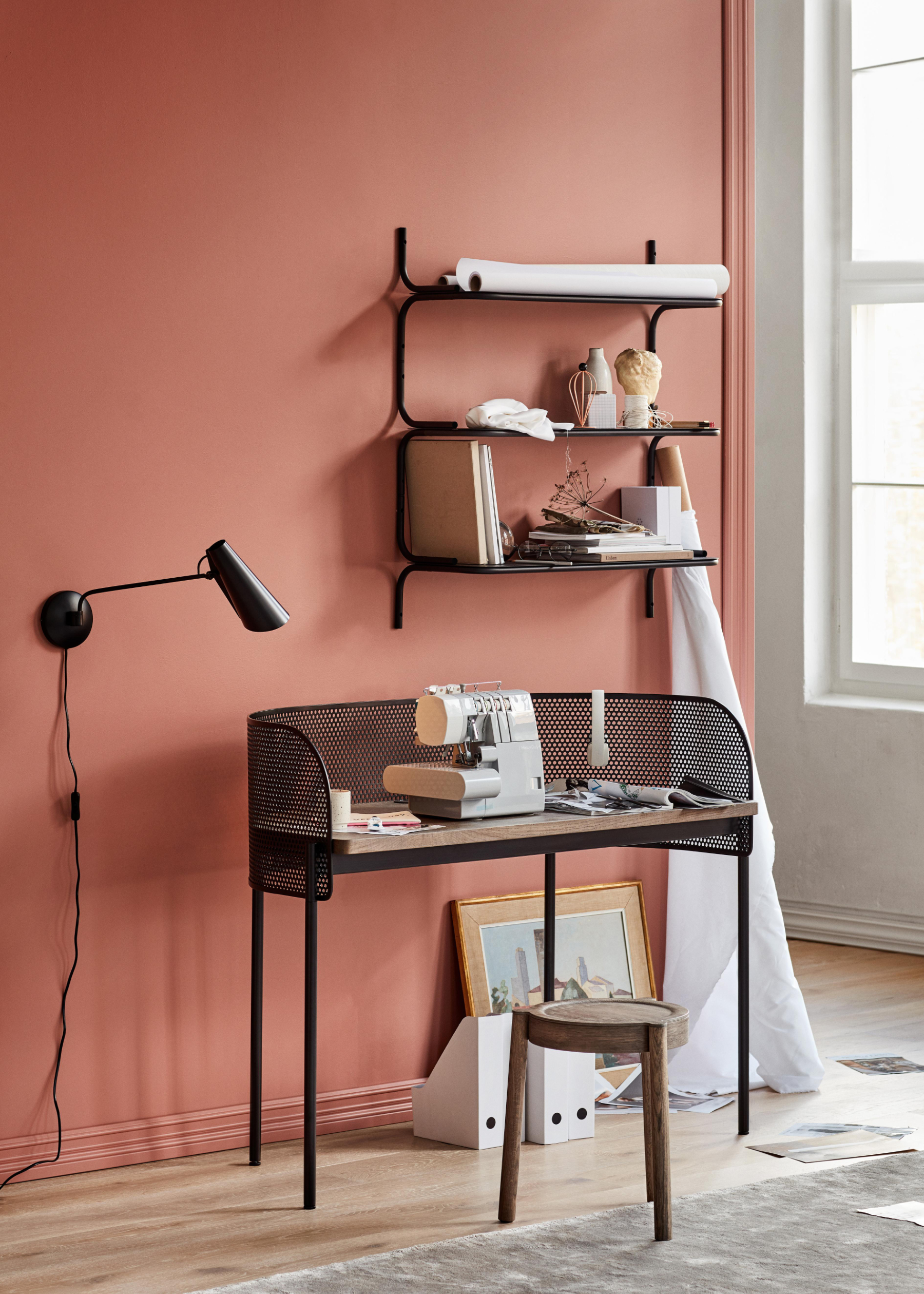 Shelter desk in contemporary office interior with refined geometry