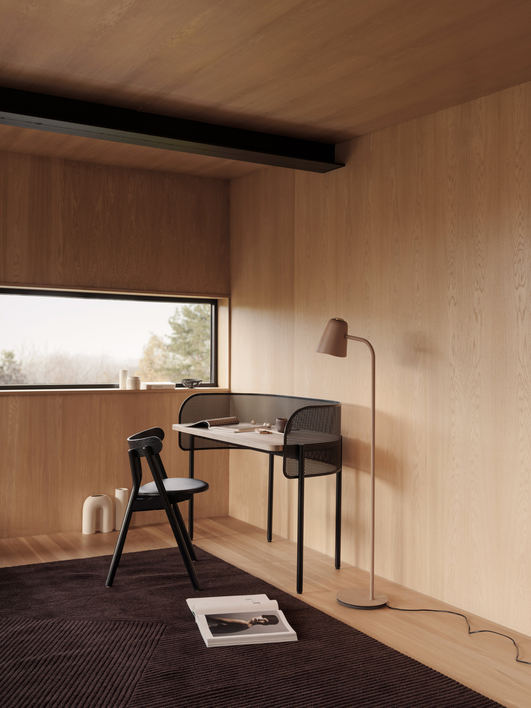 Shelter desk in contemporary office interior with refined geometry