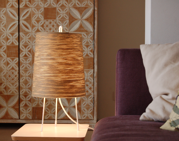 Tali lamp family with soft organic silhouettes in interior space