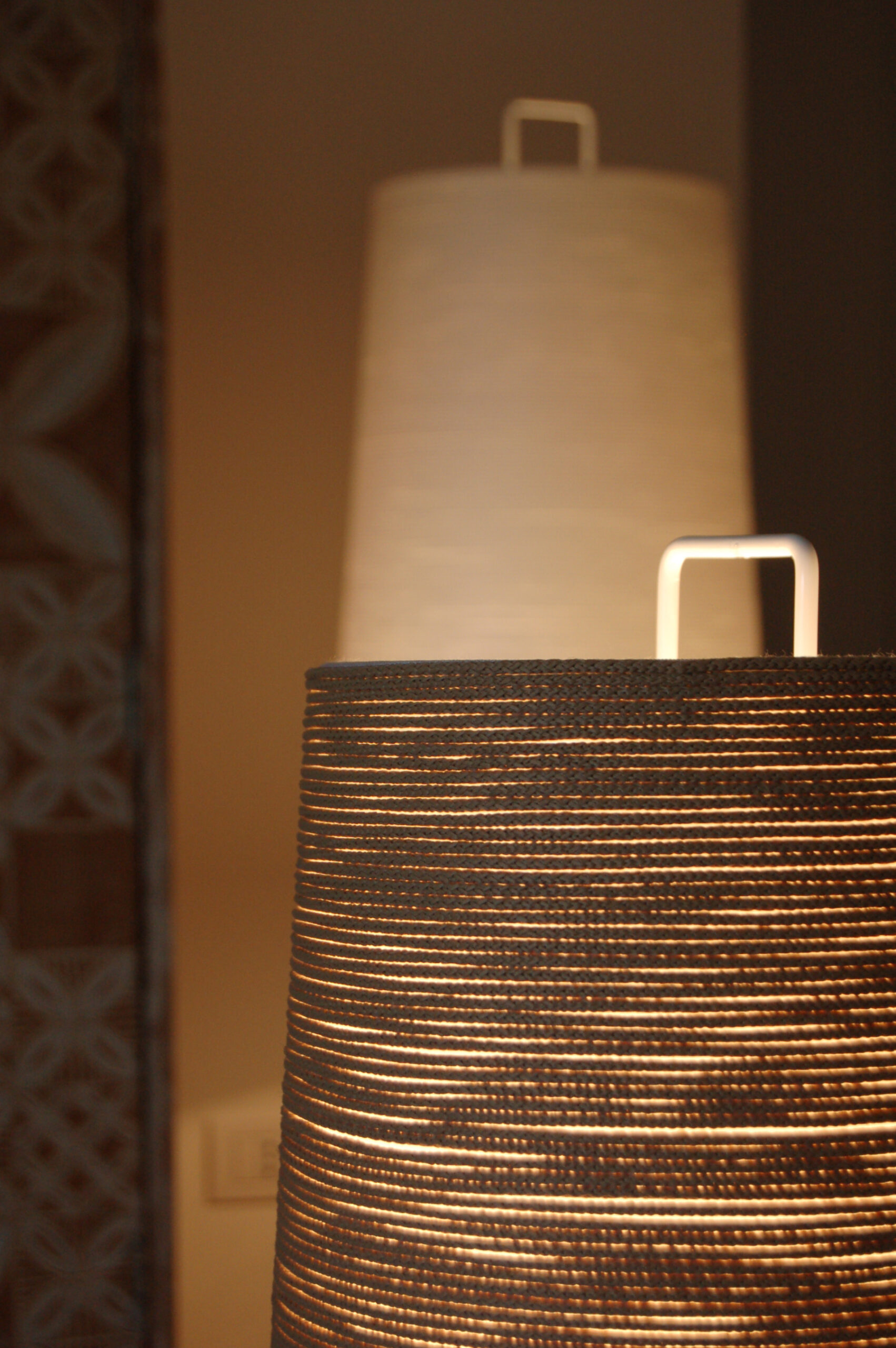 Tali lamp family with soft organic silhouettes in interior space