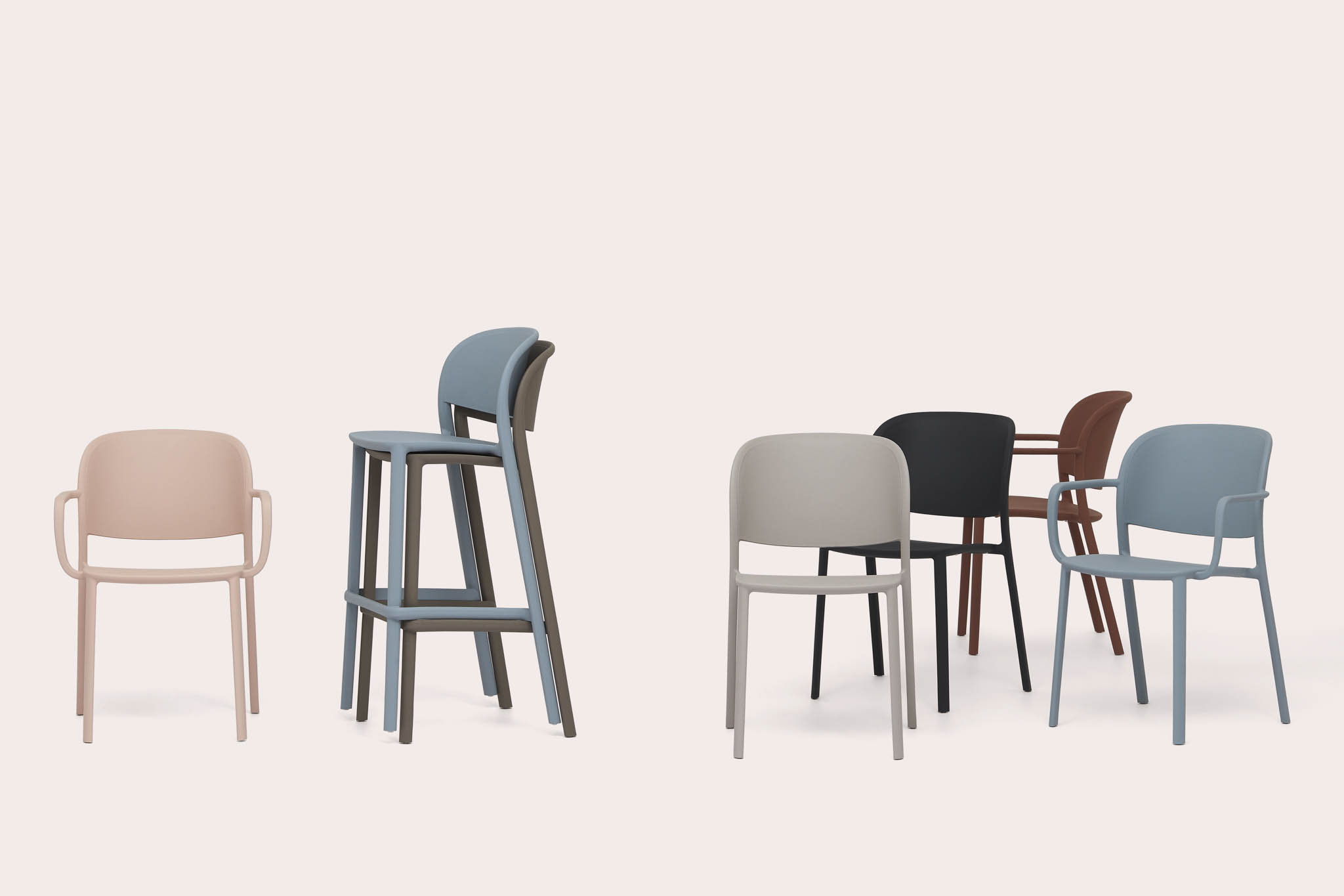 Contemporary chair with fluid silhouette and continuous curves balancing comfort and refined proportion