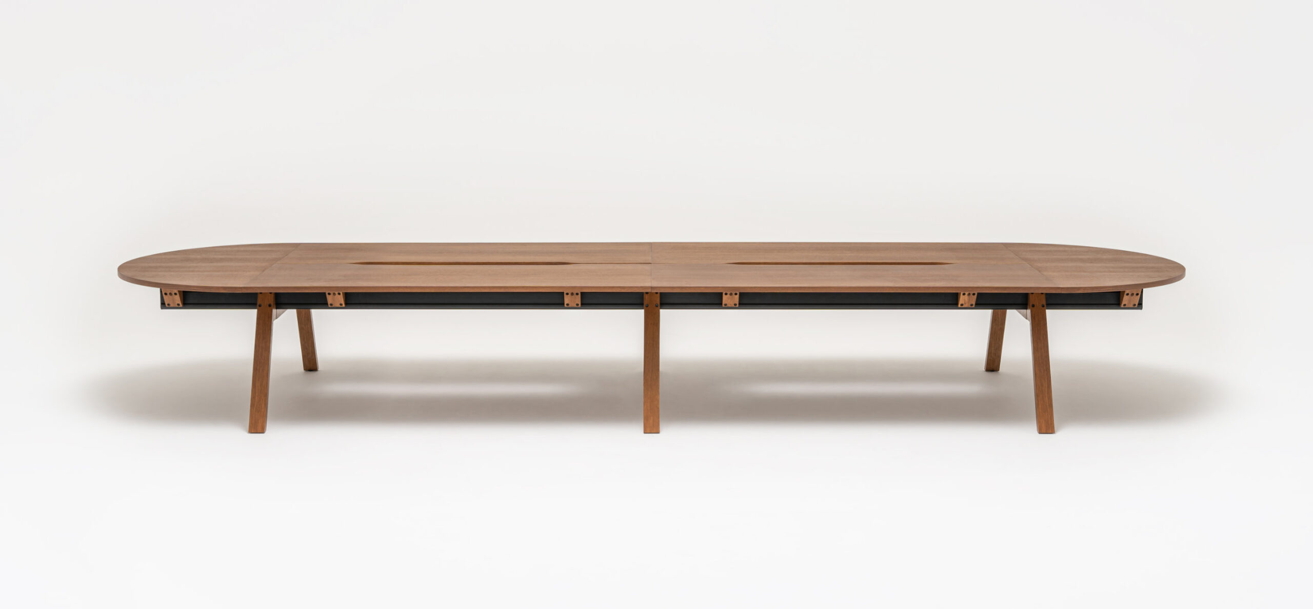 Viga Table System with multiple workstations in a collaborative office environment