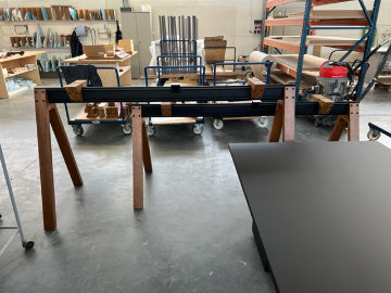 Viga Table System with multiple workstations in a collaborative office environment