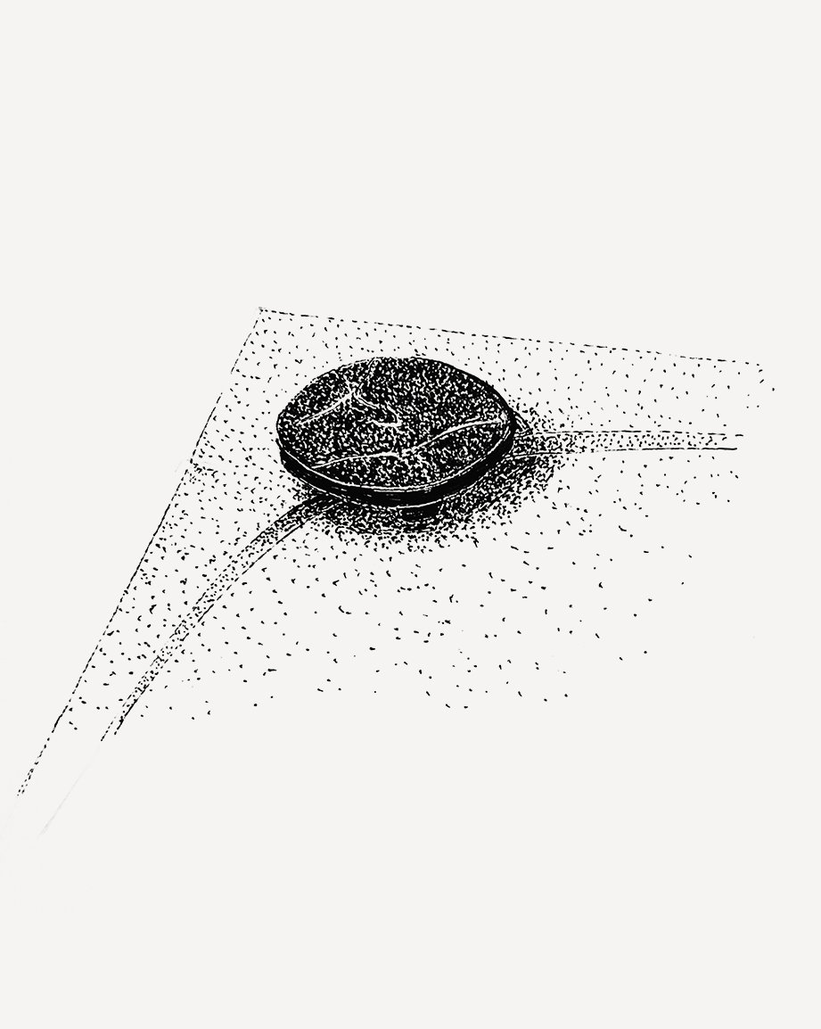 Rectangular Wave shower tray with integrated circular natural stone grate in modern bathroom setting