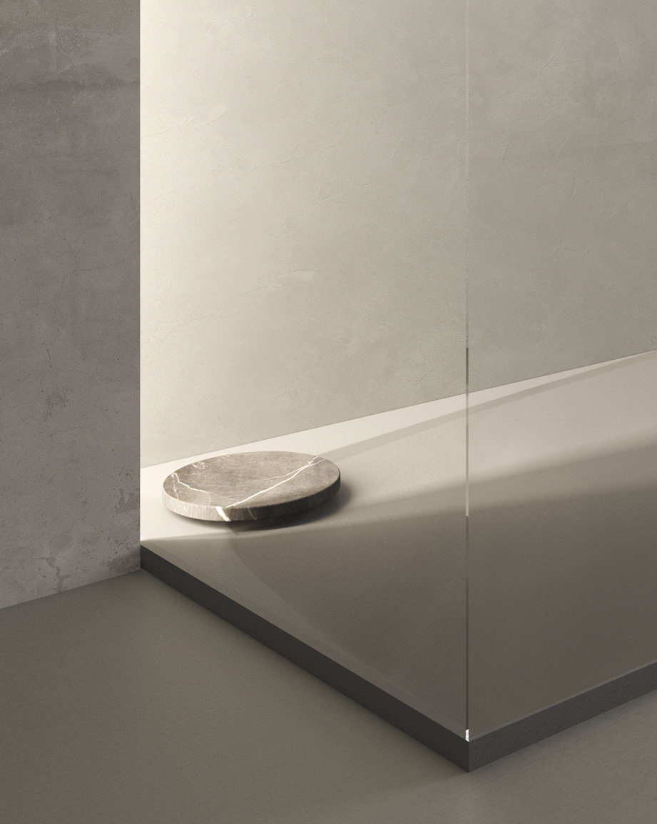 Rectangular Wave shower tray with integrated circular natural stone grate in modern bathroom setting