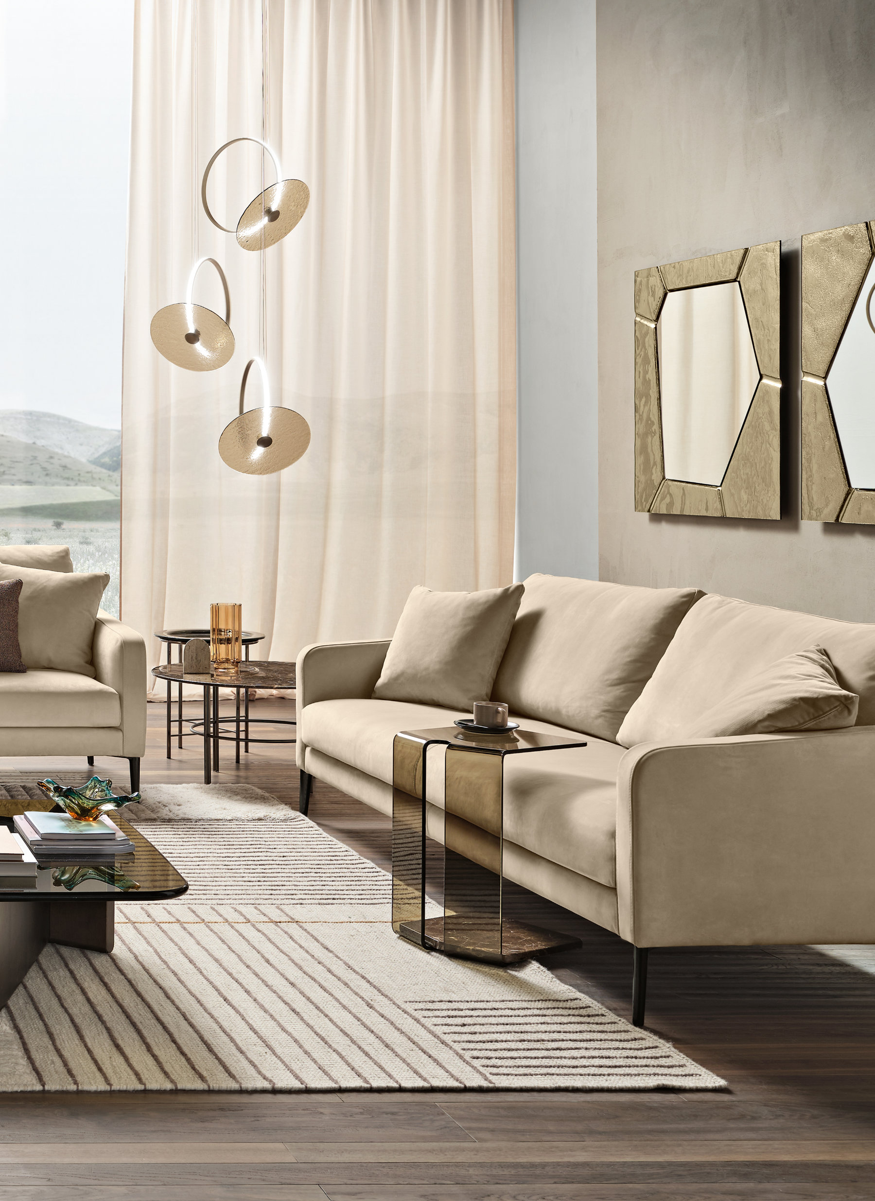 York glass side table with slender structural frame in contemporary interior